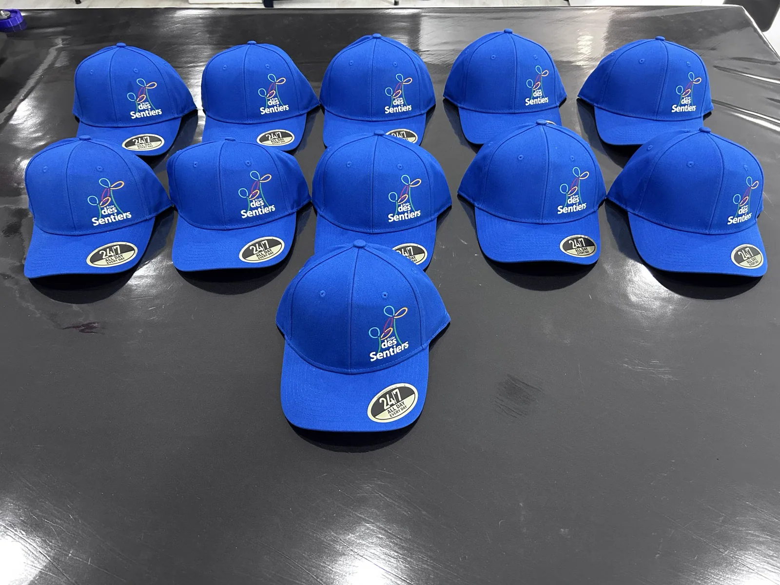 École des Sentiers — casquettes brodées